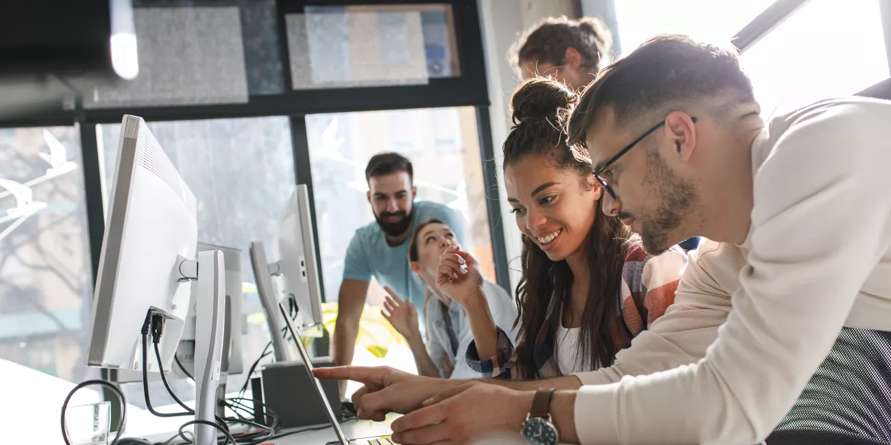 Young people working in front of computer